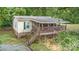 Charming home featuring a spacious deck and a well-maintained yard at 5523 Flint Ridge Church Rd, Marshville, NC 28103