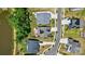 Aerial view of homes with solar panels and landscaped yards, set in a peaceful neighborhood at 6136 Sandy Point Ln, Belmont, NC 28012