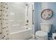 Bathroom with a white tub and shower combination at 6136 Sandy Point Ln, Belmont, NC 28012