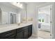 Bathroom with double vanity, lots of light, and modern fixtures at 6136 Sandy Point Ln, Belmont, NC 28012