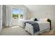 Bright bedroom with two twin beds, large window, and neutral decor at 6136 Sandy Point Ln, Belmont, NC 28012