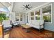 Relaxing deck with comfortable seating, ceiling fan, and overhead lights at 6136 Sandy Point Ln, Belmont, NC 28012