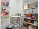 Organized storage closet with shelves, baskets, and drawers for optimal space utilization at 6136 Sandy Point Ln, Belmont, NC 28012