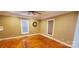 Cozy bedroom featuring hardwood floors and a ceiling fan at 615 Grier St, Lincolnton, NC 28092