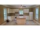 Well-lit kitchen with an island at 615 Grier St, Lincolnton, NC 28092
