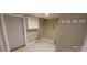 Functional laundry room with cabinet and new flooring at 615 Grier St, Lincolnton, NC 28092