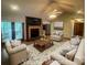 Comfortable living room offers a fireplace and neutral tones at 6339 River Front Dr, Harrisburg, NC 28075