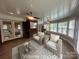 Bright sunroom with hardwood floors and an abundance of natural light at 6339 River Front Dr, Harrisburg, NC 28075