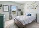 Light and airy bedroom featuring a window view and charming decor at 7318 Rupell Dr, Charlotte, NC 28273