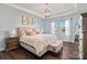 Serene main bedroom with a plush bed, decorative lighting, and large windows for natural light at 7318 Rupell Dr, Charlotte, NC 28273