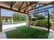 This home boasts a backyard golf simulator for the golf enthusiast to practice on at 8300 Fairview Rd, Charlotte, NC 28226