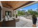 Inviting outdoor living space with a pool, spa, cabana, fireplace and comfortable seating at 8300 Fairview Rd, Charlotte, NC 28226