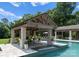 Enjoy the serene waterfall feature of this gorgeous pool, with ample lounging space at 8300 Fairview Rd, Charlotte, NC 28226