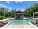 This beautiful pool area offers serene lounge areas and covered outdoor living spaces at 8300 Fairview Rd, Charlotte, NC 28226