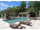 The expansive pool area is perfect for recreation, with ample lounge chairs and covered areas at 8300 Fairview Rd, Charlotte, NC 28226