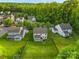Spacious backyard, surrounded by a sleek black fence, complements the home's outdoor charm at 865 Wingthorn Rose Dr, Gastonia, NC 28056
