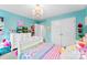 A stylish bedroom featuring a closet, a double bed, and bright natural lighting at 865 Wingthorn Rose Dr, Gastonia, NC 28056