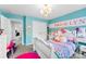 Well-designed bedroom with 'Brooklyn' wall decor and ample lighting, creating a fun and inviting space at 865 Wingthorn Rose Dr, Gastonia, NC 28056