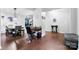 Dining area with table, office desk, and dark-toned hardwood flooring at 865 Wingthorn Rose Dr, Gastonia, NC 28056