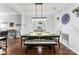 The dining room and living area features an open-concept design with stylish decor at 865 Wingthorn Rose Dr, Gastonia, NC 28056