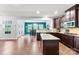 Well-equipped kitchen boasting granite countertops, a kitchen island, and ample cabinet space at 865 Wingthorn Rose Dr, Gastonia, NC 28056