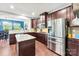 Modern kitchen featuring granite countertops, stainless steel appliances, and custom cabinetry at 865 Wingthorn Rose Dr, Gastonia, NC 28056