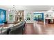 Spacious living room showcasing a stone fireplace, hardwood floors, and open floor plan at 865 Wingthorn Rose Dr, Gastonia, NC 28056