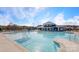 Community pool with a sun-drenched deck and plenty of space for lounging and swimming at 9528 Maltese Dr, Gastonia, NC 28056