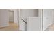 Bright hallway featuring neutral walls and plush carpeting leading to other rooms in the home at 9528 Maltese Dr, Gastonia, NC 28056