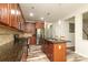 Spacious kitchen with granite countertops, a center island, and stainless steel appliances at 10217 Falling Leaf Dr, Concord, NC 28027