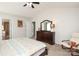 Warm bedroom features stylish furniture, soft carpet, and ample natural light at 10217 Falling Leaf Dr, Concord, NC 28027