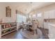 Cozy dining area with a round table and elegant chandelier for a stylish dining experience at 1022 Curling Creek Dr, Indian Trail, NC 28079
