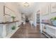 Elegant hallway with beautiful hardwood floors and decorative accents throughout at 1022 Curling Creek Dr, Indian Trail, NC 28079