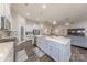 Spacious kitchen with an island, stainless steel appliances, and an open view to living area at 1022 Curling Creek Dr, Indian Trail, NC 28079