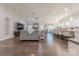 Expansive living room features hardwood floors, a stone fireplace, and ample natural light at 1022 Curling Creek Dr, Indian Trail, NC 28079