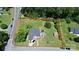 Spacious property featuring a house, detached garage, and well-maintained lawn outlined in red at 1105 S Point Rd, Belmont, NC 28012