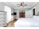 Spacious bedroom featuring hardwood floors, a brick fireplace, and an inviting atmosphere at 1105 S Point Rd, Belmont, NC 28012