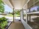 Inviting front porch with craftsman columns and decorative hanging plants offering a cozy entryway at 1124 Hunter St, Statesville, NC 28677