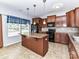 Spacious kitchen with granite countertops, stainless steel appliances, and a large center island at 1124 Hunter St, Statesville, NC 28677