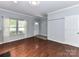 Bright living room with hardwood floors and white trim features plenty of natural light at 1124 Hunter St, Statesville, NC 28677