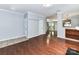 Spacious living room with hardwood floors offers a versatile space for living and dining at 1124 Hunter St, Statesville, NC 28677