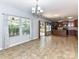Open concept living space with a bright kitchen, spacious dining area, and lots of natural light at 1124 Hunter St, Statesville, NC 28677