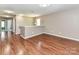 Spacious loft area with hardwood floors, neutral paint, and ample natural light at 1124 Hunter St, Statesville, NC 28677