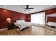 Spacious bedroom featuring hardwood floors, large window, and neutral tones with ample natural light at 1166 Rocky River Rd, Lancaster, SC 29720