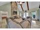 Spacious living room with stone fireplace and tall ceilings at 1166 Rocky River Rd, Lancaster, SC 29720