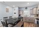 Open-concept kitchen and dining area featuring stainless steel appliances and a pantry at 122 Dyssa Loop, Statesville, NC 28625
