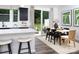 Dining area with modern table, chairs, and sliding glass doors to outdoor patio at 12305 Gambrell Dr, Charlotte, NC 28278