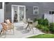 Cozy patio features outdoor seating and manicured landscaping, perfect for relaxing and entertaining at 12309 Gambrell Dr, Charlotte, NC 28278