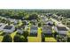 Neighborhood aerial view of single Gathering homes with manicured lawns and mature trees in a quiet suburban setting at 12724 Frank Wiley Ln, Charlotte, NC 28278