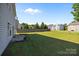 Spacious backyard offers a large grassy area at 12724 Frank Wiley Ln, Charlotte, NC 28278
